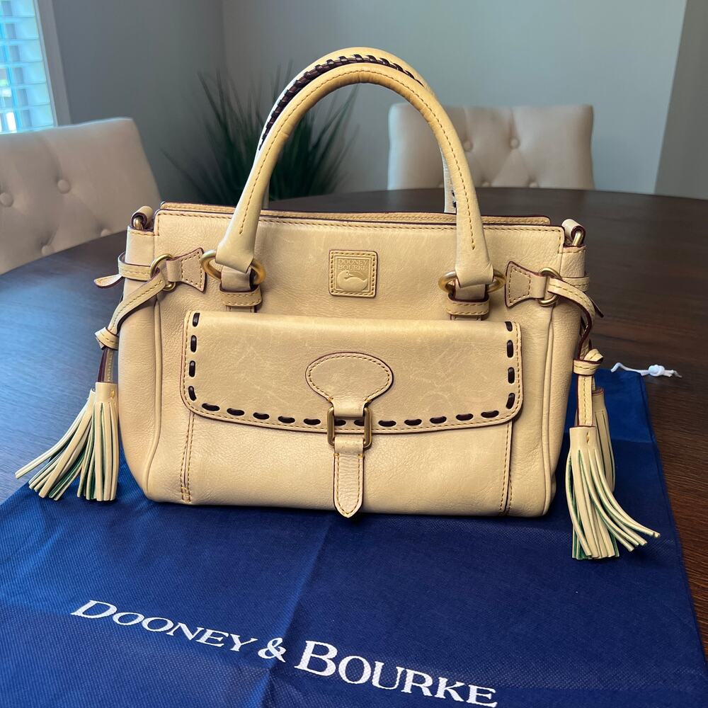 Dooney & Bourke Cream Leather Satchel with Tassel Accents